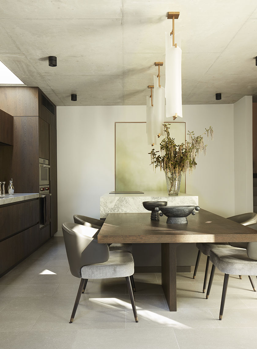 15_Nina-Maya-Residence_K Modern Dining Area with Marble Accents: A contemporary dining room with a marble-topped table, modern lighting fixtures, and minimalist decor. Interior design by Nina Maya Interiors at Residence K, Potts Point.