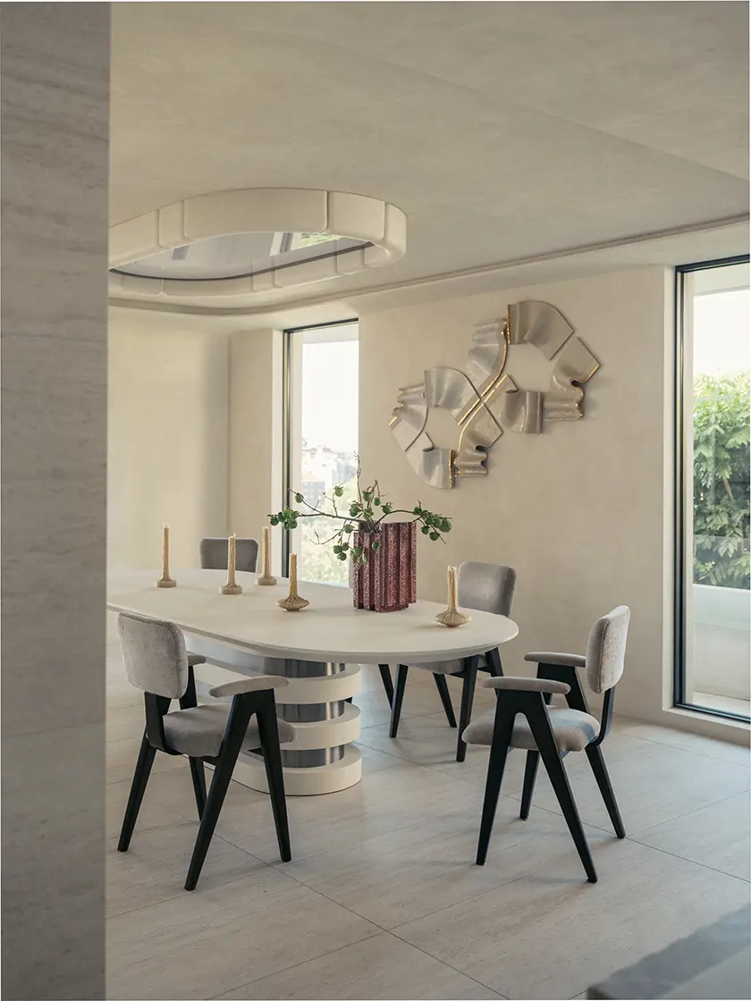 Nina_Maya_FAIRFAX-331 Dining table setting beneath artwork and a pendant light in a neutral interior, design by Nina Maya Interiors