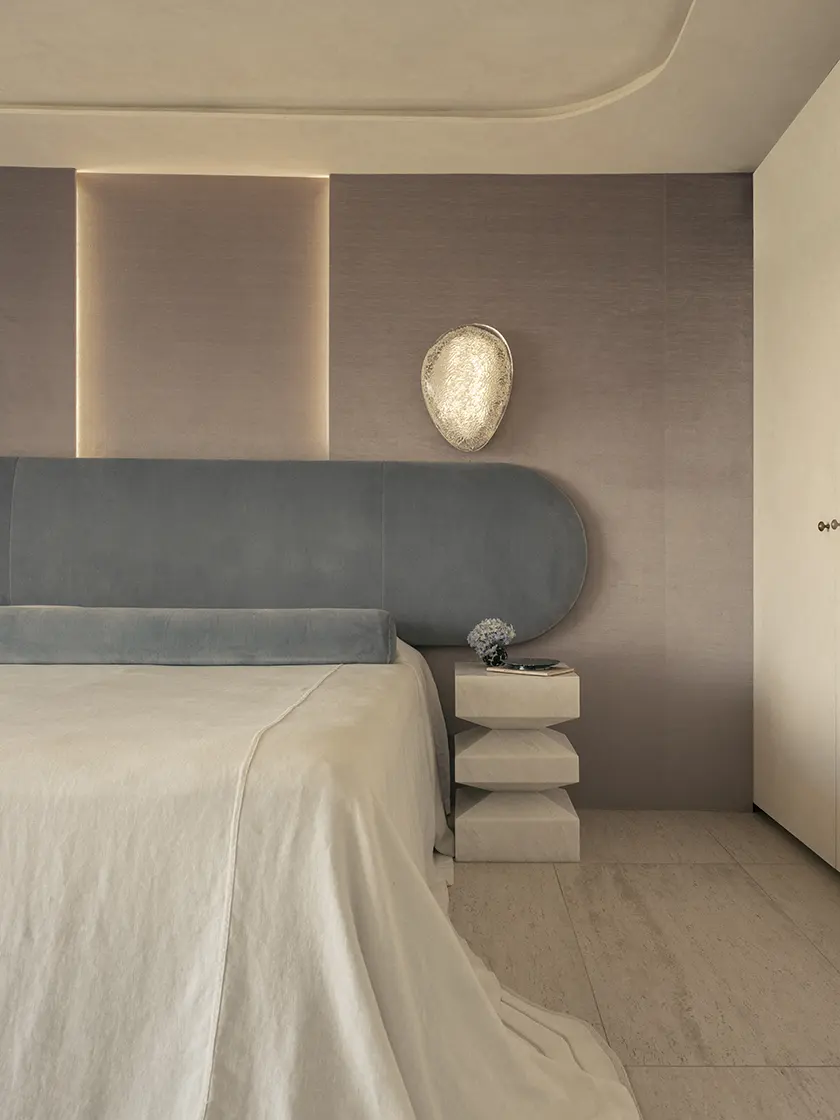 251202 – NM – FAIRFAX-97-Edit Bedroom with textured feature wall, upholstered bed and calm neutral tones, design by Nina Maya Interiors