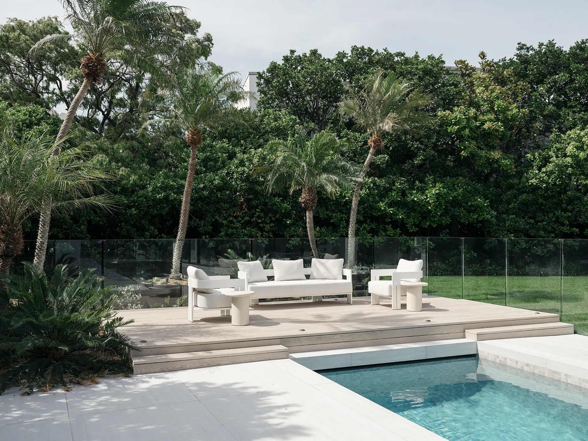 RESIDENCE S–136-Edit Exterior view of Cliffside Villa with terraces and coastal setting, interior design by Nina Maya Interiors